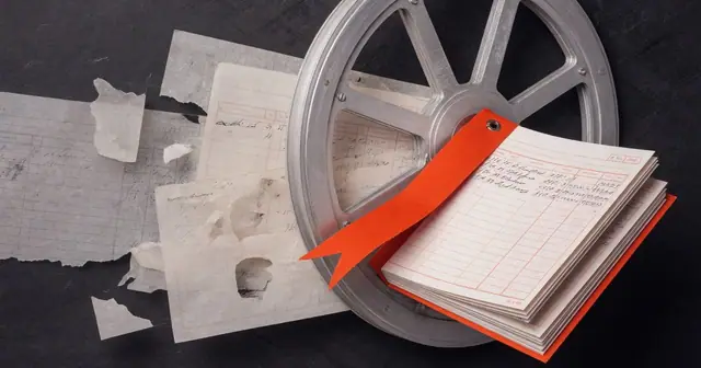 Editorial illustration of fading archival pages and a red index ribbon beside a metal archive wheel, representing historical block retrieval.
